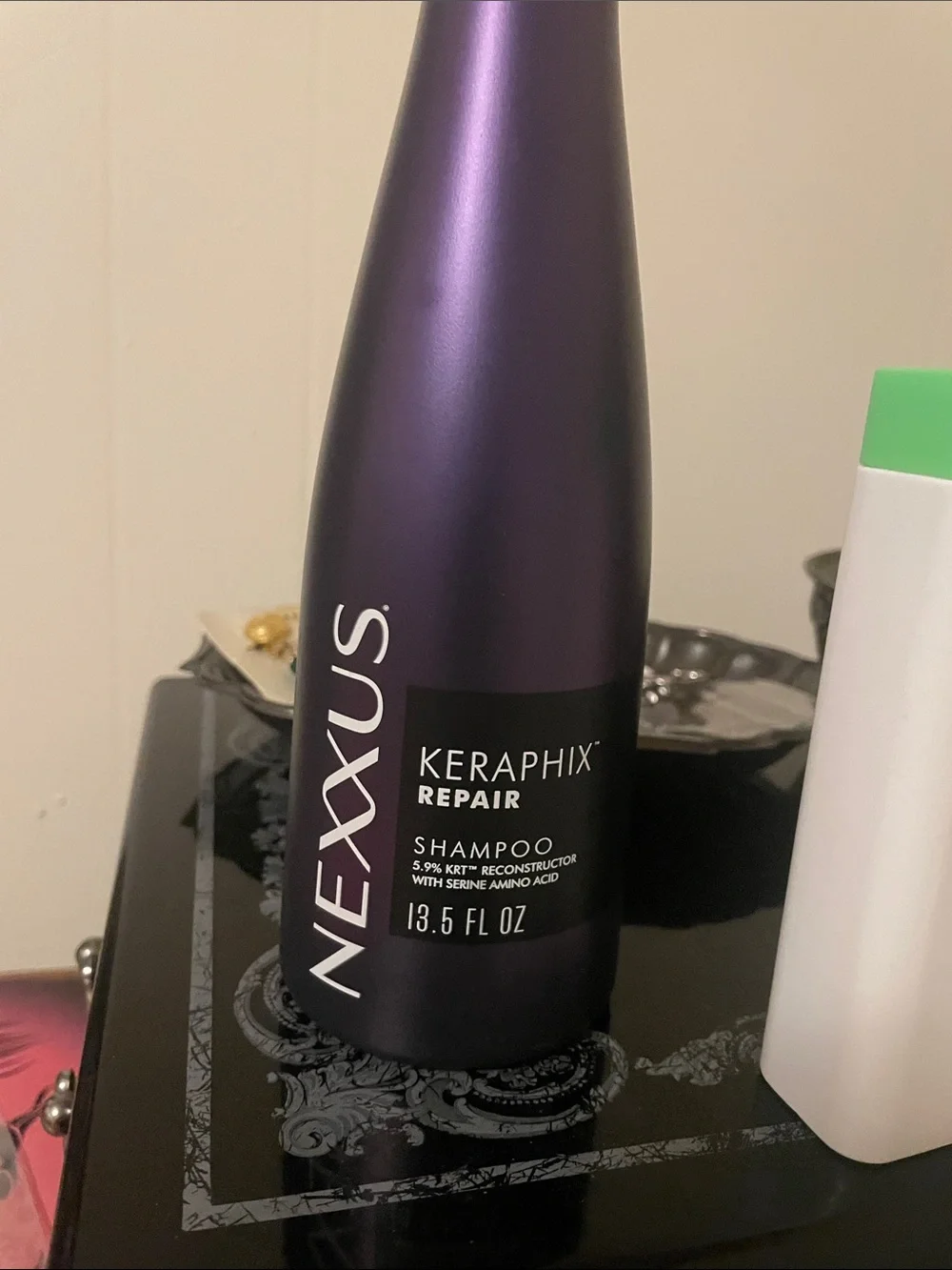 Drunk Elephant Cocomino Glossing Shampoo and Nexxus Keraphix repair